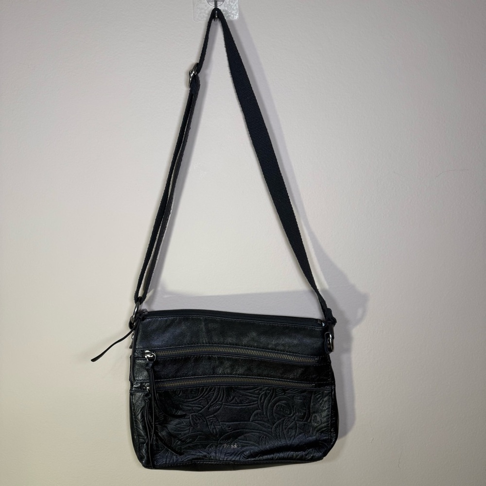 The Sak Black Leather Reseda Crossbody Bag Triple Zipper Embossed Leaf Print